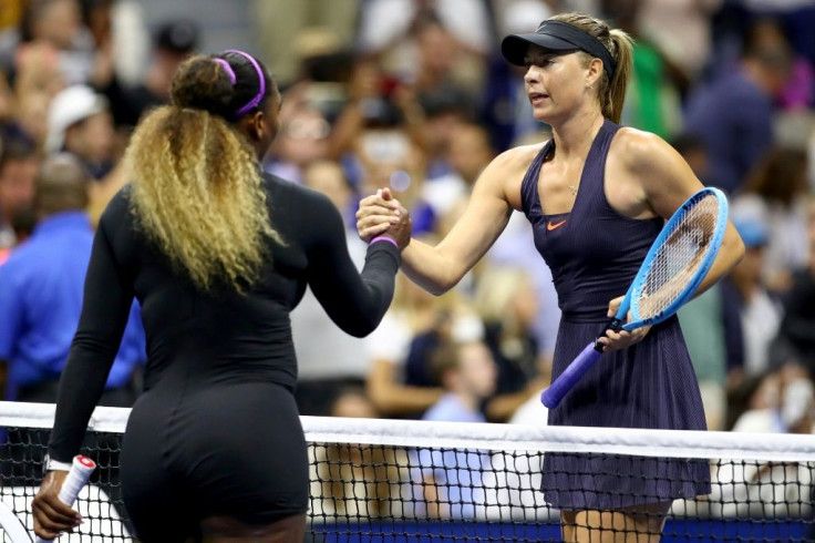 Serena Williams (L) shakes hands with Maria Sharapova after beating her Russian rival for a 19th straight time