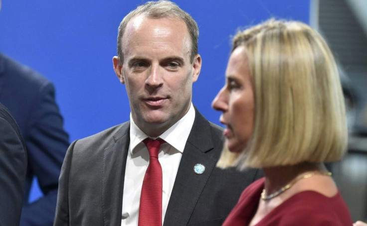 British Foreign Minister Dominic Raab (L) and EU diplomatic chief Federica Mogherini are pictured in Helsinki, Finland on August 29
