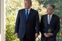 US President Donald Trump -- seen with Fed chief Jerome Powell at the White House in November 2017 -- has repeatedly hit out at the head of the US central bank