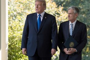 US President Donald Trump -- seen with Fed chief Jerome Powell at the White House in November 2017 -- has repeatedly hit out at the head of the US central bank