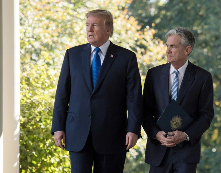 US President Donald Trump -- seen with Fed chief Jerome Powell at the White House in November 2017 -- has repeatedly hit out at the head of the US central bank