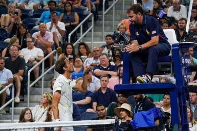 Russian Daniil Medvedev argues with chair umpire Damien Dumusois during his victory over Spain's Feliciano Lopez on Friday at the US Open