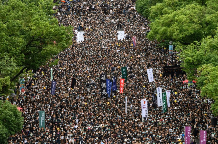 Thousands of university students started a boycott of classes with a mass rally in support of Hong Kong's anti-government protests