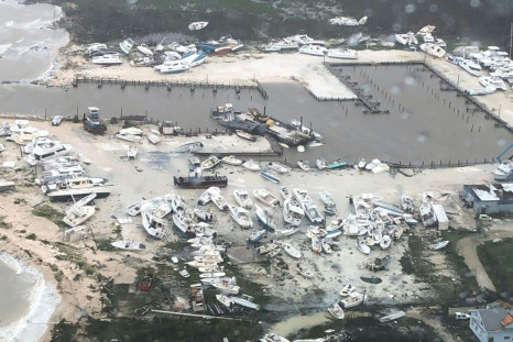 In this image courtesy of the US Coast Guard, boats are seen strewn across a marina in Andros Island, Bahamas