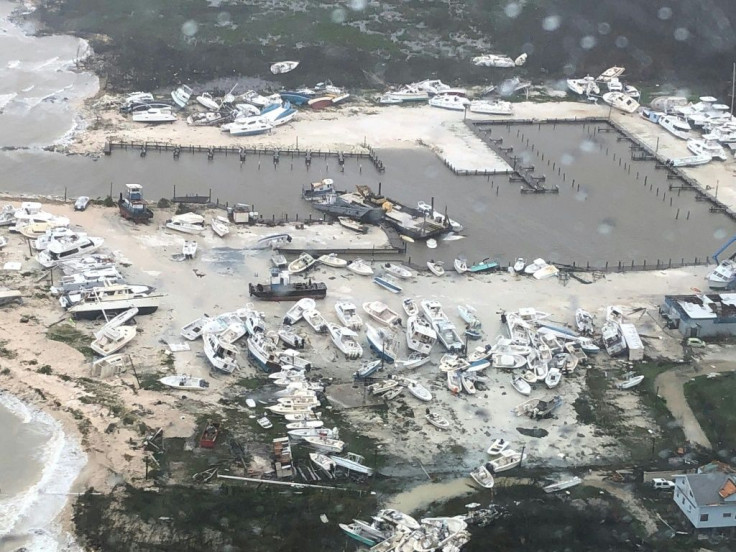 In this image courtesy of the US Coast Guard, boats are seen strewn across a marina in Andros Island, Bahamas