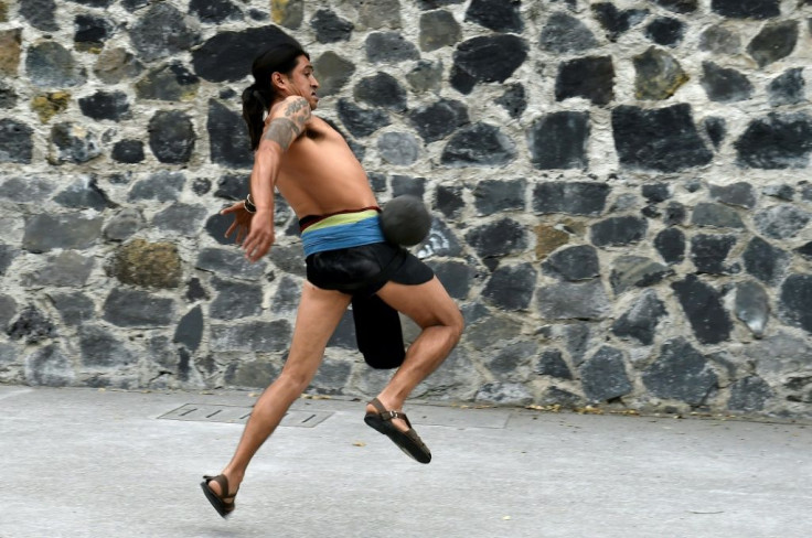 A man plays a pre-Columbian ballgame called "ulama," a ceremonial sport that dates back 3,500 years and is experiencing a renaissance in Mexico City