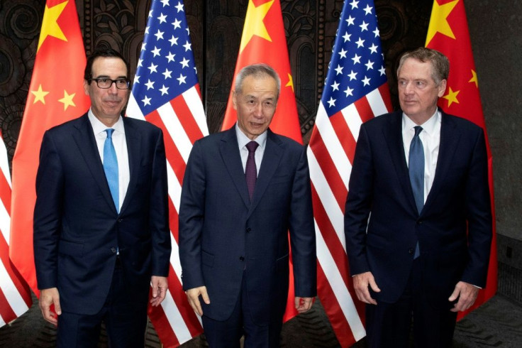 High-level US-China trade talks are expected to resume in October for the first time since this July meeting with Chinese Vice Premier Liu He (C), US Trade Representative Robert Lighthizer (R) and Treasury Secretary Steve Mnuchin