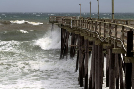 Waves crash as Hurricane Dorian make its way to Cape Hatteras in North Carolina, which the state's governor warned is facing a "long night" from the storm