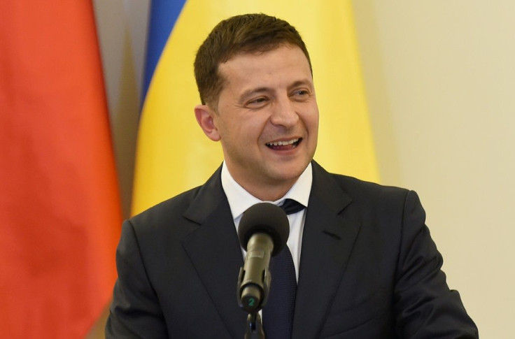 President Volodymyr Zelensky, pictured in August 2019, has enjoyed a strong political mandate to pursue a reform agenda, Fitch said in its report