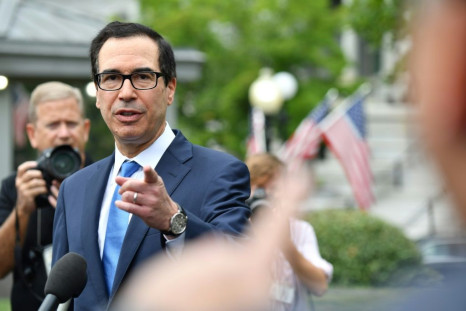 US Treasury Secretary Steven Mnuchin (L) says the trade war with China has had no impact on the US economy and he sees no sign of a recession