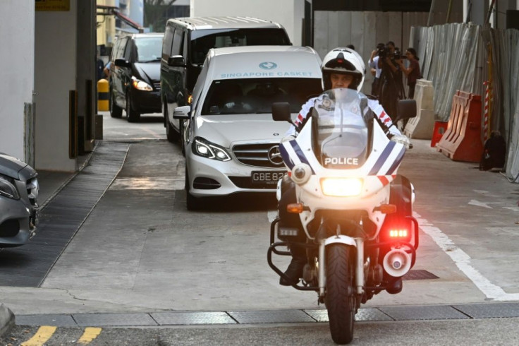 A hearse transporting Mugabe's body left a Singapore funeral parlour accompanied by a police escort