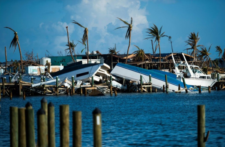 Destroyed boats are pushed up against the pier in the aftermath of Hurricane Dorian in Treasure Cay on Abaco island, Bahamas