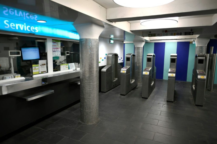 Metro turnstiles were left open at the Les Halles station, normally a bustling commuter hub, during the Paris metro strike on Friday.