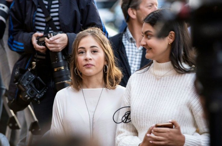 Fans wait for actress Felicity Huffman to leave the John Joseph Moakley United States Courthouse in Boston, where she was sentenced for her role in the college admissions scandal