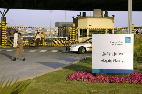 Saudi security guard the entrance of the state oil giant Aramco in Abqaiq in the oil-rich Eastern Province in a 2006 picture