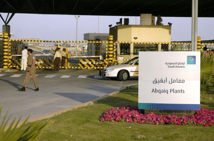 Saudi security guard the entrance of the state oil giant Aramco in Abqaiq in the oil-rich Eastern Province in a 2006 picture