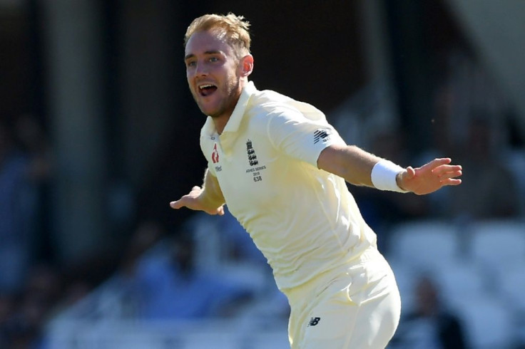 England's Stuart Broad celebrates after taking the wicket of Australia's David Warner on the fourth day of the fifth Ashes Test at the Oval