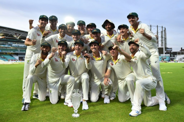 Australia's captain Tim Paine,(C holding the Ashes Urn), said winning the first Test at Edgbaston, where Australia triumphed by 251 runs, had been crucial for his side's confidence