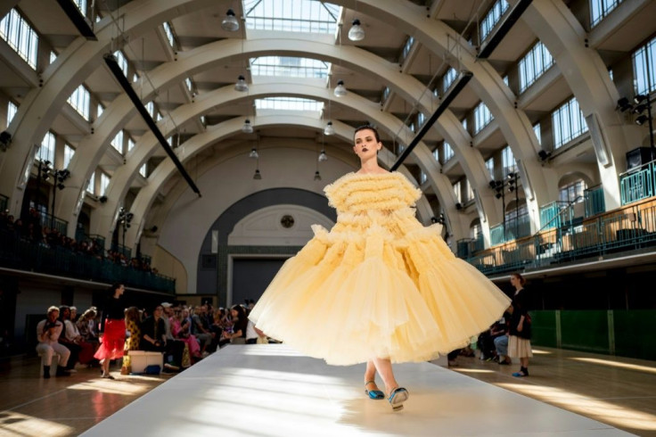 Goddard sent out her models in voluminous skirts and dresses, with vibrant colours such as canary yellow and coral, worn with flat leather boots