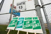 United Auto Workers (UAW) strike signs are at a gate at the General Motors Flint Assembly Plant after the UAW declared a national strike against GM at midnight on September 16, 2019 in Flint, Michigan