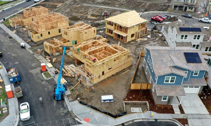 (FILES) In this file photo taken on January 31, an aerial view of homes under construction at a housing development in Petaluma, California. Sales of new US homes declined in July, while home prices rose and the inventory of available homes climbed slight