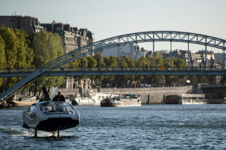 An Electric boat, the Sea Bubbles, aka "flying taxi" cruises on the river Seine during a test in Paris, on September 18, 2019.