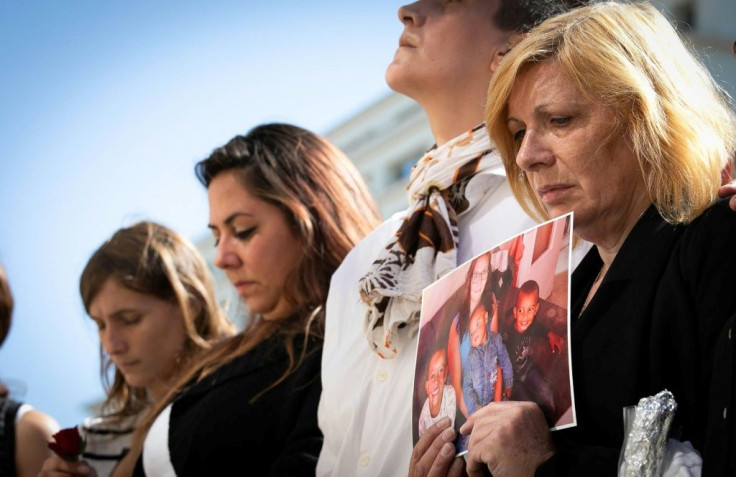 The mother (right) of Johanna, who was stabbed to death by her partner in front of their three children, attended a rally against domestic violence in Le Havre, northwest France