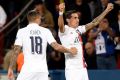Angel Di Maria celebrates with Mauro Icardi after scoring one of his two goals as Paris Saint-Germain beat Real Madrid 3-0 in their Champions League opener