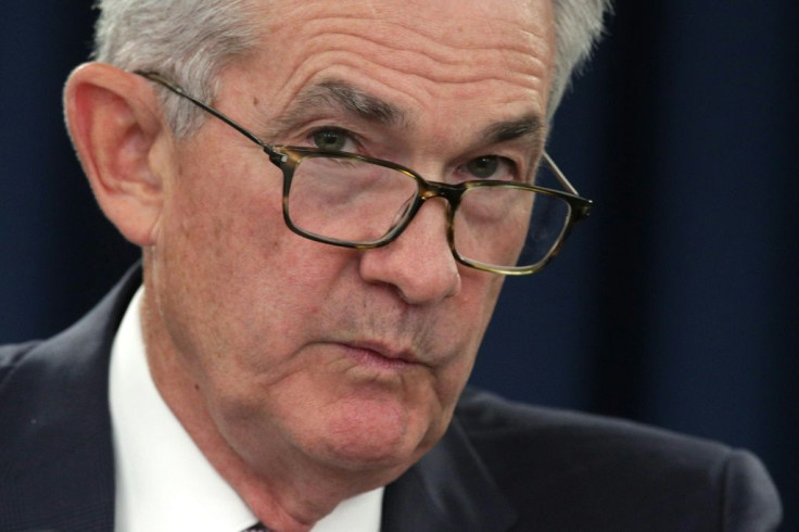 Federal Reserve boss Jerome Powell said the bank 'will act as appropriate' to support the economy