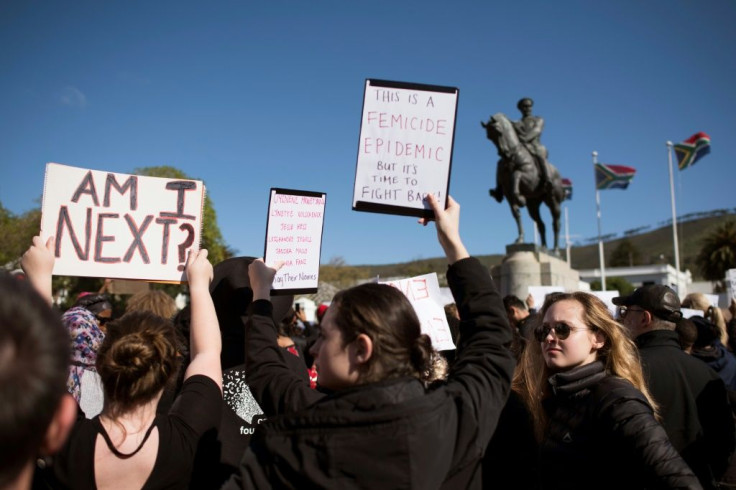 Women in South Africa have been marching under the hash tag #AmINext