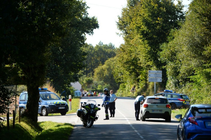 Police set up a security perimeter and evacuated eight houses near the site where a Belgian F-16 fighter jet crashed in western France on Thursday.