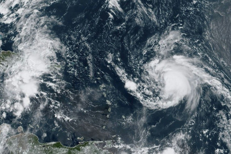Hurricane Jerry swirls in the Atlantic on September 19 in this satellite image obtained from NOAA/RAMMB