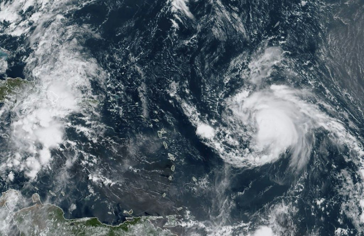 Hurricane Jerry swirls in the Atlantic on September 19 in this satellite image obtained from NOAA/RAMMB