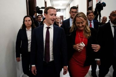 Facebook chief executive Mark Zuckerberg held private meetings with US lawmakers in Washington to discuss technology regulations and social media issues, including concerns about the social network's operations