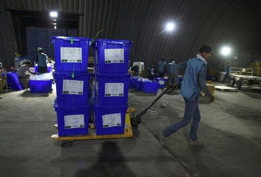 The young employees at Afghanistan's Independent Electoral Commission are rushing through final preparations for the vote, set for September 28