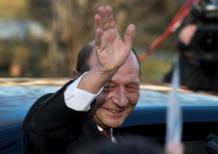 OFormer president Traian Basescu, seen at a 2014 inauguration ceremony for his successor Klaus Iohannis, said he would appeal against the court finding that he collaborated with Communist-era secret police