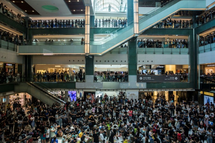 Thousands gathered inside a mall in the northern town of Sha Tin to sing protest songs and make origami cranes