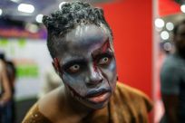 A cosplayer is dressed as a character from "The Walking Dead"
