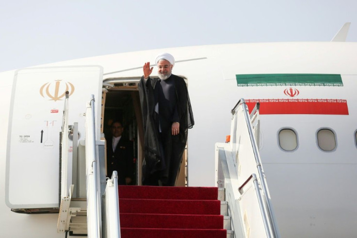 Iran's President Hassan Rouhani spoke to reporters at Mehrabad airport, en-route Monday for the UN General Assembly in New York