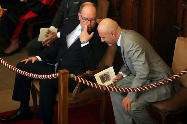 Prince Albert II of Monaco, left, with the principality's justice minister Laurent Anselmi, whose dismissal was announced Tuesday