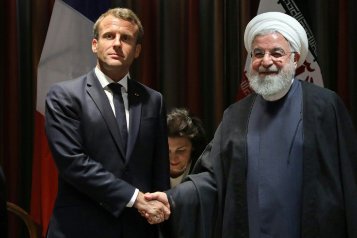 French President Emmanuel Macron and Iranian President Hassan Rouhani shake hands after a meeting at the United Nations