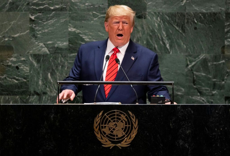 Embattled: US President Donald Trump addresses the United Nations General Assembly as calls for his impeachment mount