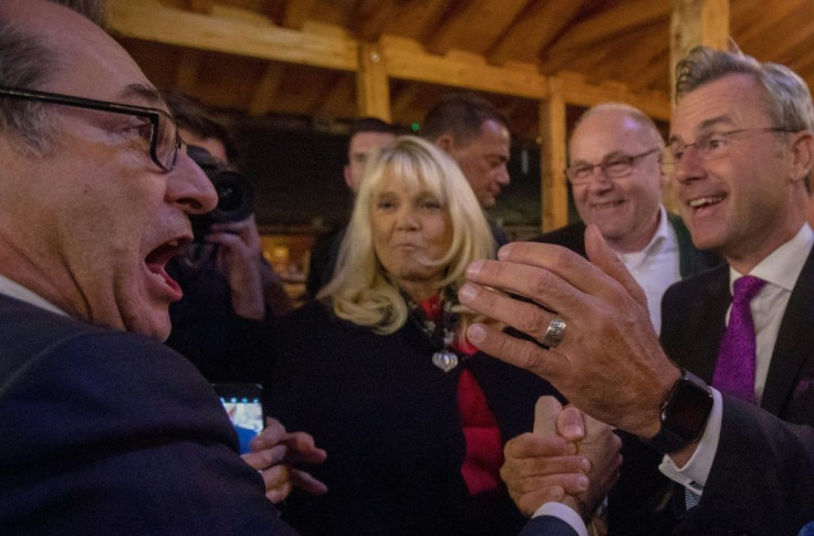 Former head of the the far-right Freedom Party Austria (FPOe) Heinz-Christian Strache (Left) greets new party leader Norbert Hofer (Right) during the FPOe Oktoberfest in Vienna ahead of snap polls on Sunday