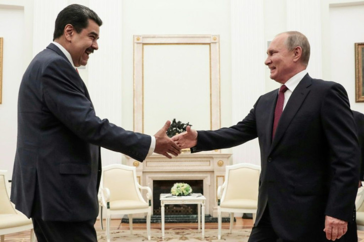 Russian President Vladimir Putin (R) welcomed embattled Venezuelan President Nicolas Maduro to the Kremlin urging dialogue with the opposition