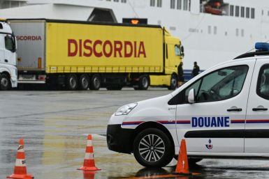 French customs officials rehearse for a no-deal Brexit at the port of Calais, submitting trucks to border checks which exporters fear could act as a brake on cross-Channel trade