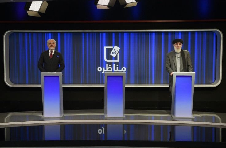 Afghan presidential candidates Abdullah Abdullah (left) and Gulbuddin Hekmatyar take part in a presidential debate at Tolo News TV station in Kabul. Current President Ashraf Ghani faced derision when he declined to particpate