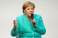 Merkel cautioned against 'overburdening' the central bank