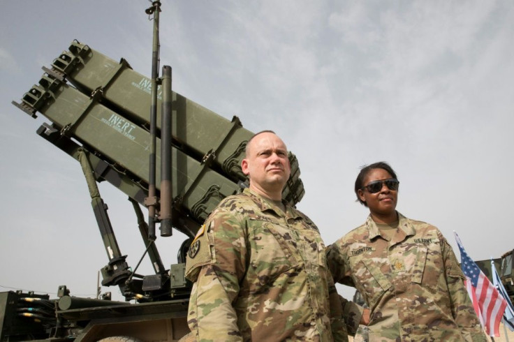 US Army officers stand in front a US Patriot missile system during 2018 exercises in Israel