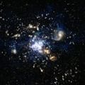 This artist's impression of the formation of a galaxy cluster in the early universe was released in 2014 as a handout by the European Southern Observatory