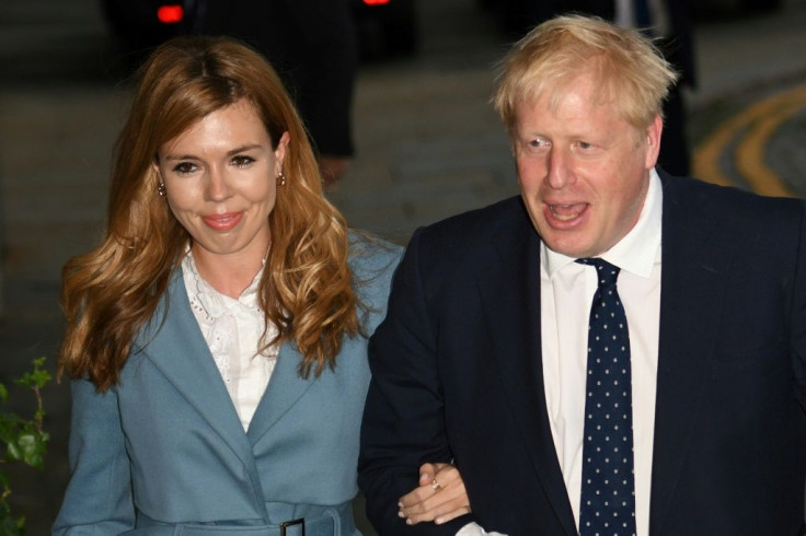 Boris Johnson arrived in Manchester for the Conservative party conference with his partner Carrie Symonds